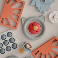 Mushie Bijtring Zon Clay